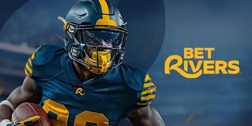 BetRivers logo next to an image of a football player in action. The player is wearing a blue and yellow uniform and helmet, carrying a football. The background is a dark, blurred stadium setting